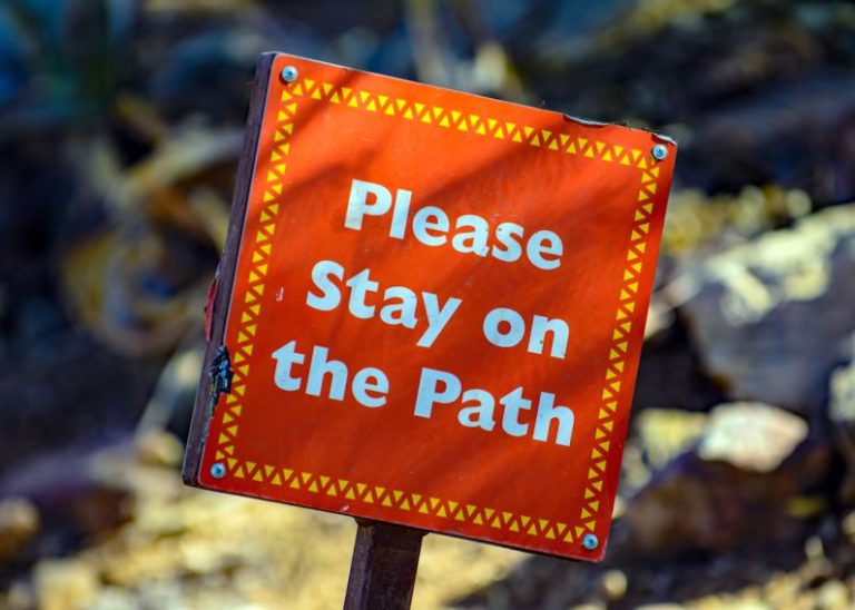 Rules - please stay on the path signage