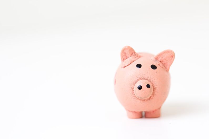 Price - pink pig figurine on white surface