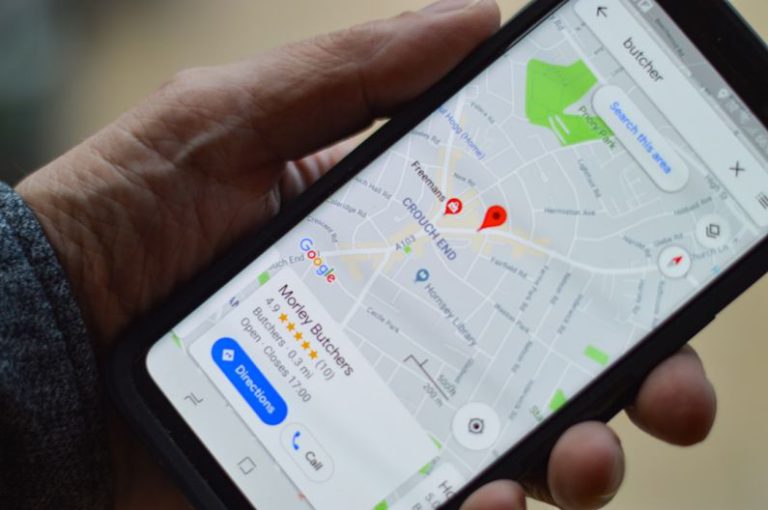 Location - person holding black smartphone