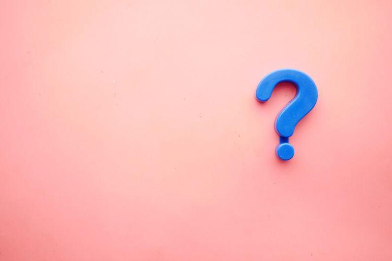 Questions - a blue question mark on a pink background