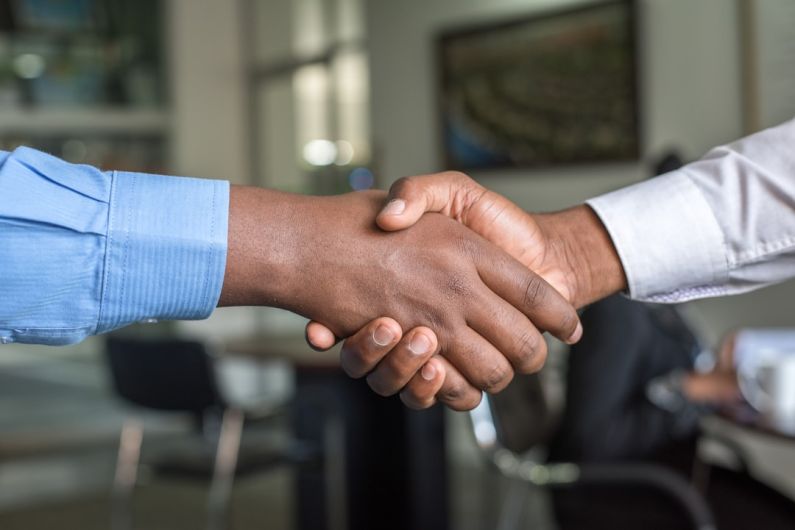 Offer - two people shaking hands