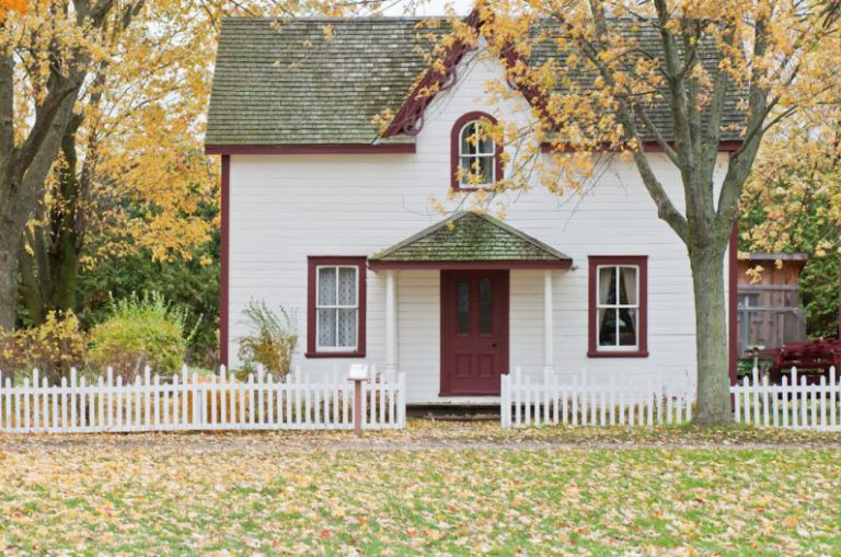 Home - white house under maple trees