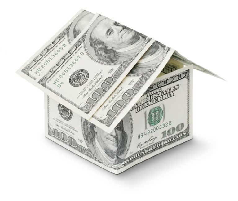Mortgage - a house made out of money on a white background
